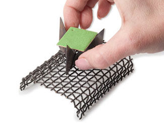 Metal square being placed onto trivet